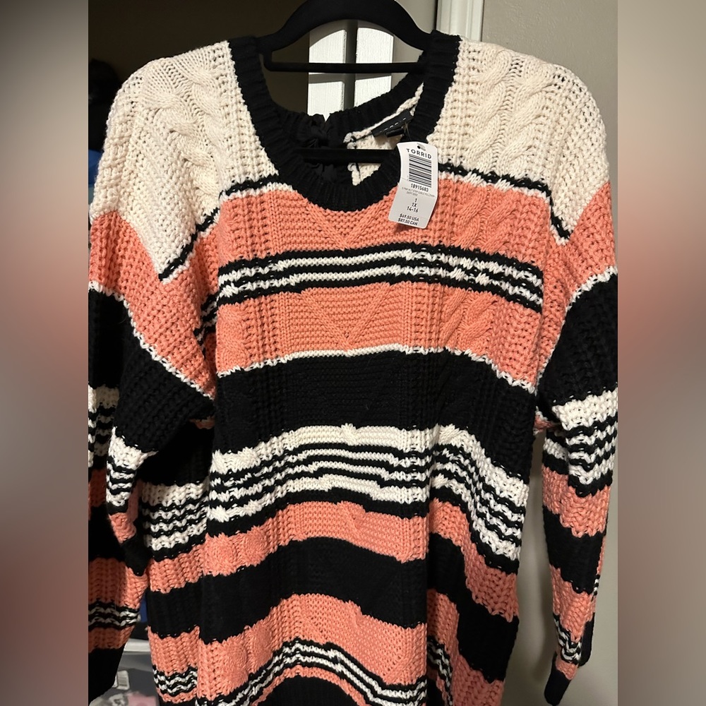 Brand new with tags Torrid sweater with bow back